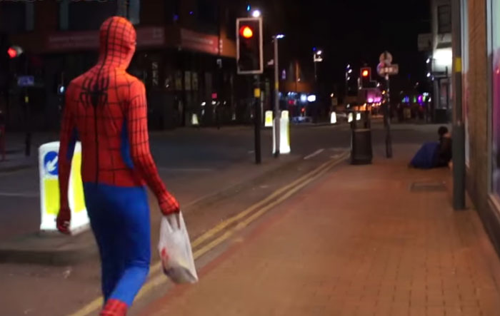 Anonymous Spiderman feed homeless at night geotv.ge